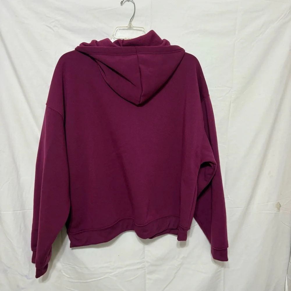 Disney purple hoodie featuring a graphic of Mickey and Minnie Mouse. - Picture 5 of 5